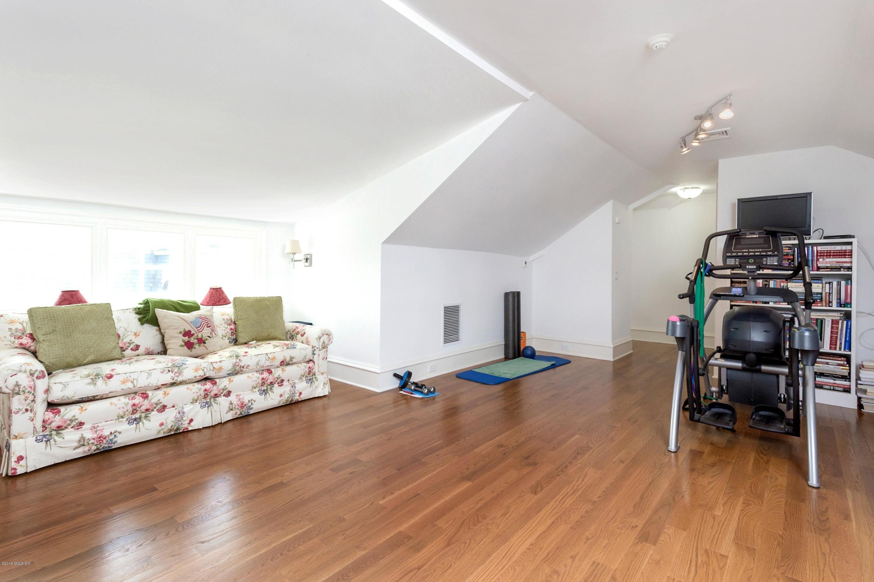 58 Ridge Street Greenwich, CT 06830 - Photo 24 of 29 a living room with furniture and a wooden floor