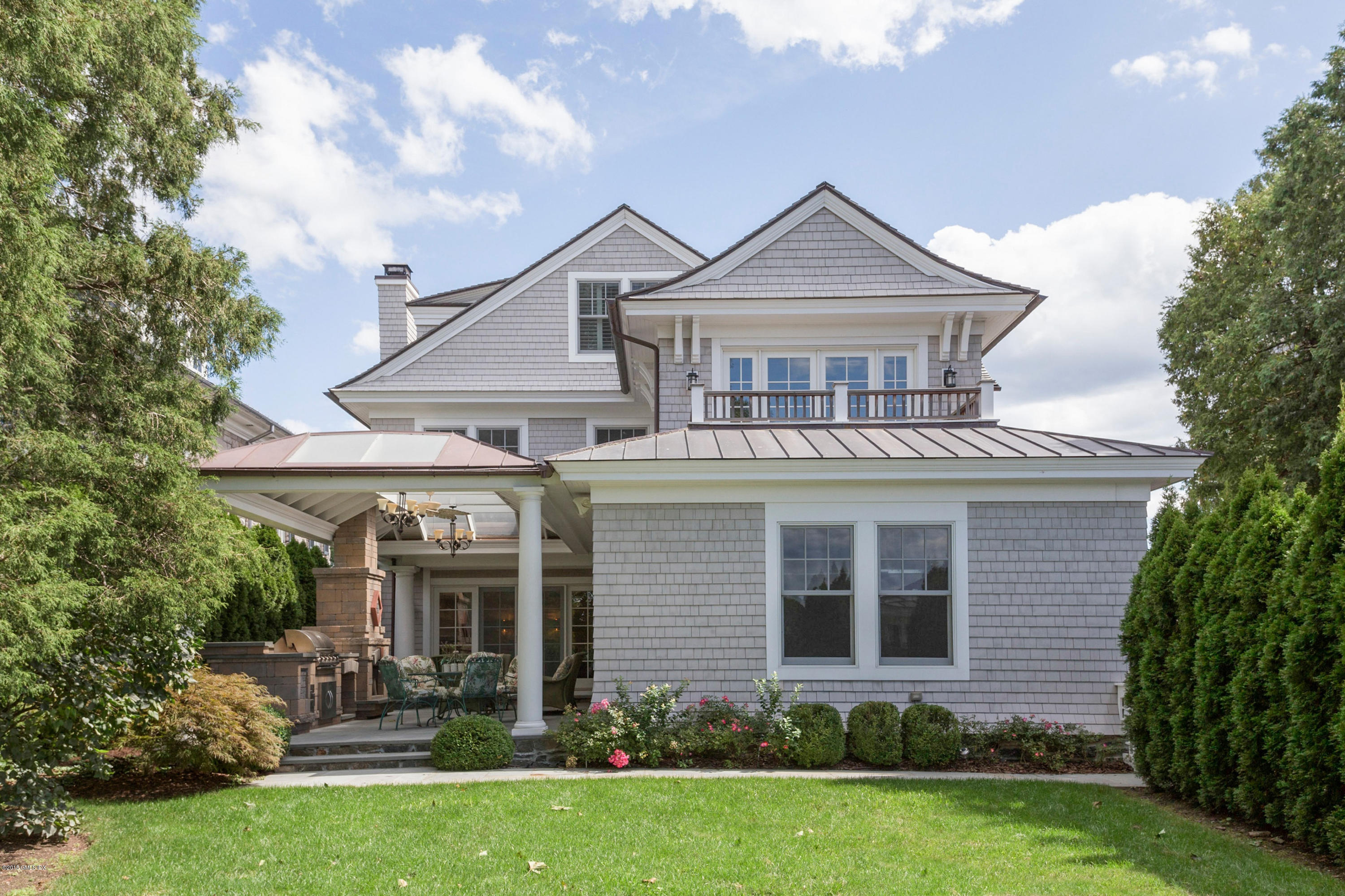 58 Ridge Street Greenwich, CT 06830 - Photo 27 of 29 a front view of a house with garden