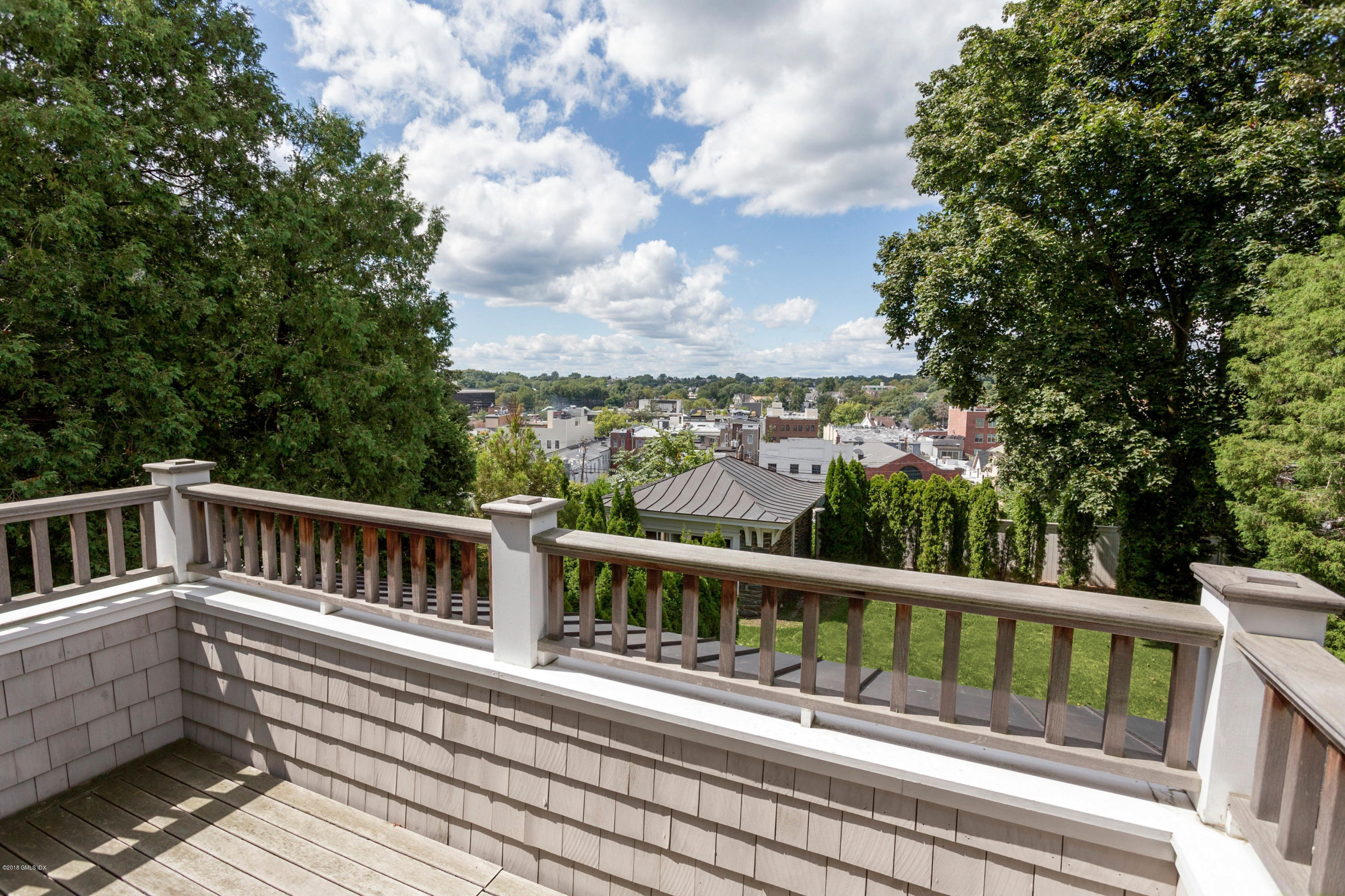 58 Ridge Street Greenwich, CT 06830 - Photo 4 of 29 a view of a balcony with wooden floor