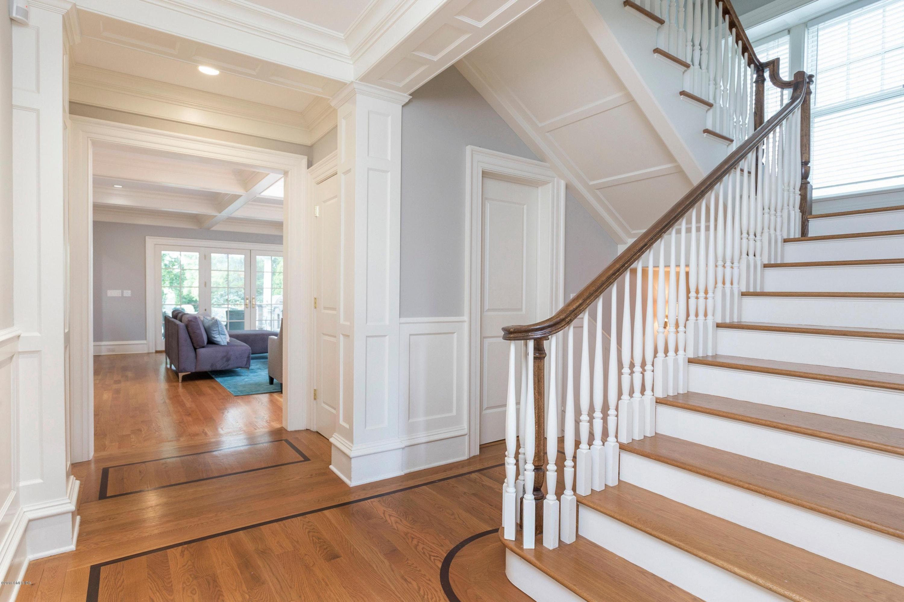 58 Ridge Street Greenwich, CT 06830 - Photo 5 of 29 a view of entryway and hall with wooden floor