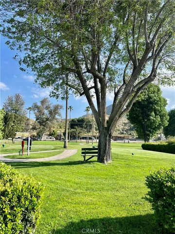 a view of an outdoor space and tennis court