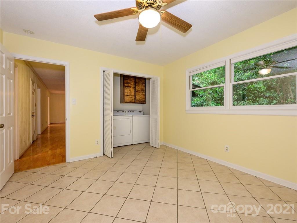 857 Pinebranch Road Rock Hill, SC 29730 - Photo 18 of 30 a view of a livingroom with a chandelier fan and windows