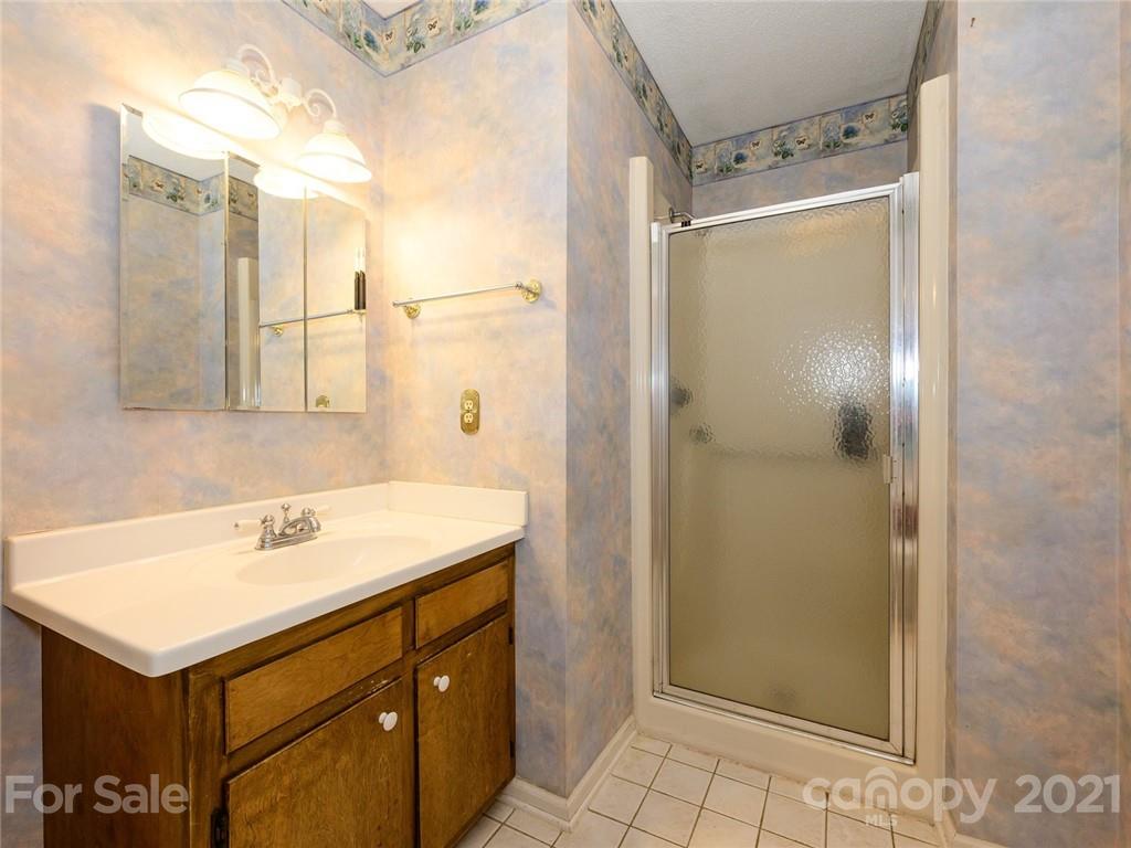 857 Pinebranch Road Rock Hill, SC 29730 - Photo 20 of 30 a bathroom with a sink vanity and shower