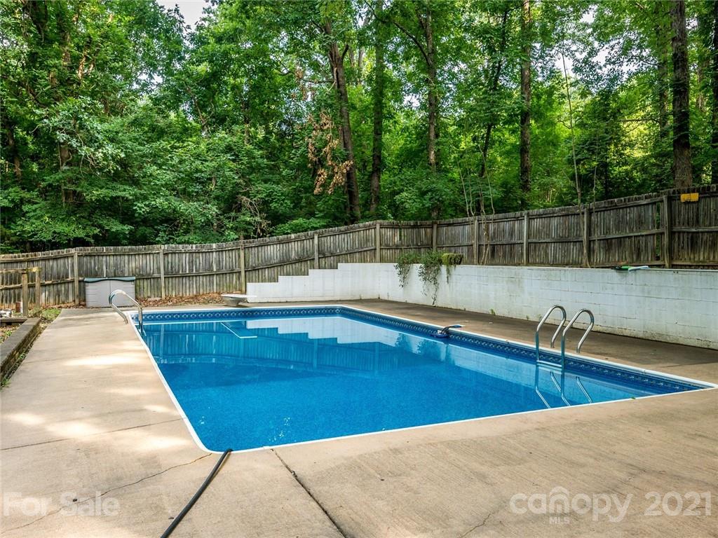 857 Pinebranch Road Rock Hill, SC 29730 - Photo 29 of 30 a view of a swimming pool with a chair