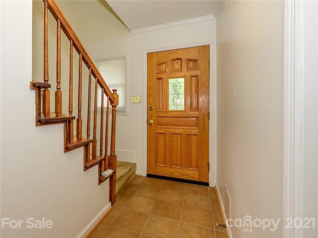 857 Pinebranch Road Rock Hill, SC 29730 - Photo 5 of 30 a view of a hallway with wooden floor and staircase
