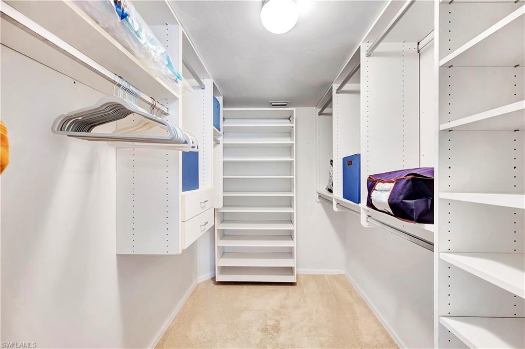1925 Courtyard Way, Unit F101 Naples, FL 34112 - Photo 12 of 20 Primary Bedroom Closet