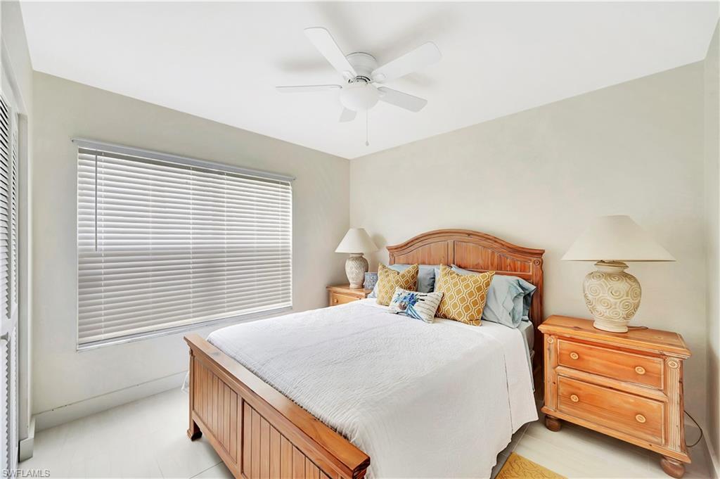 1925 Courtyard Way, Unit F101 Naples, FL 34112 - Photo 13 of 20 Guest Bedroom