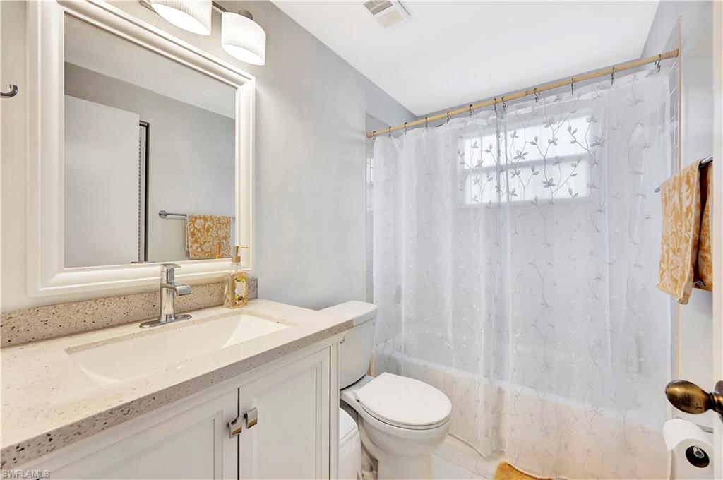 1925 Courtyard Way, Unit F101 Naples, FL 34112 - Photo 15 of 20 Guest Bedroom