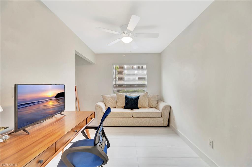 1925 Courtyard Way, Unit F101 Naples, FL 34112 - Photo 18 of 20 Den with desk and sleeper sofa