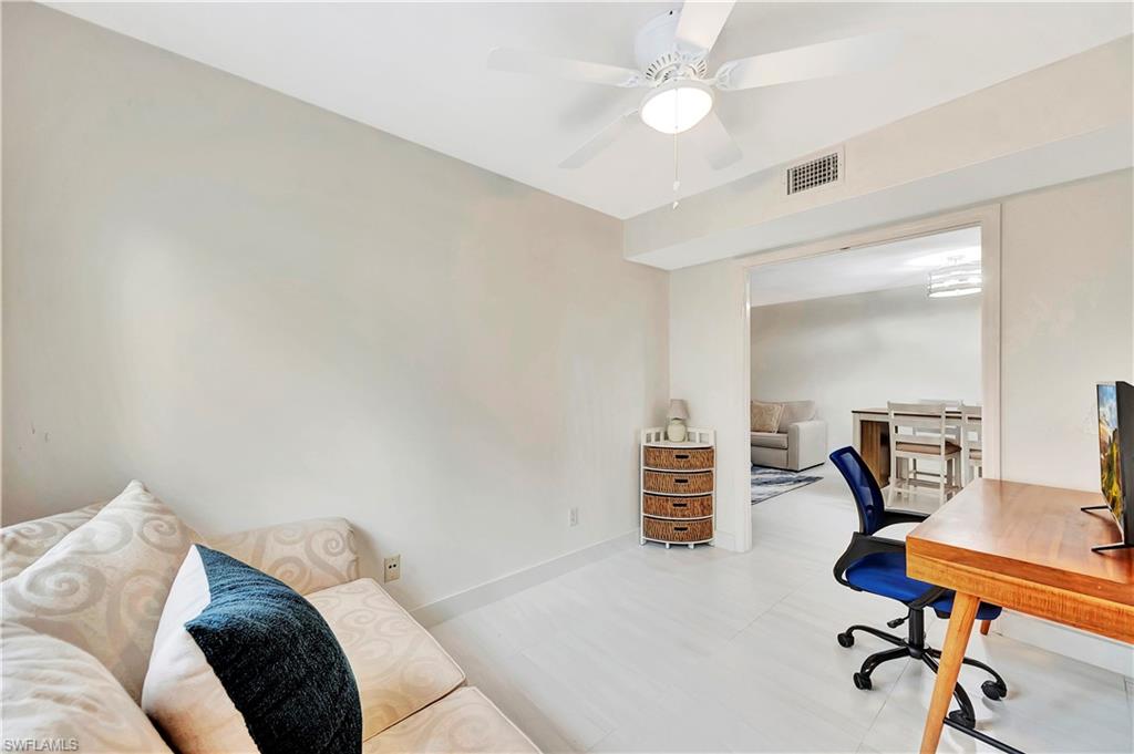 1925 Courtyard Way, Unit F101 Naples, FL 34112 - Photo 19 of 20 Den open to living/ dining area