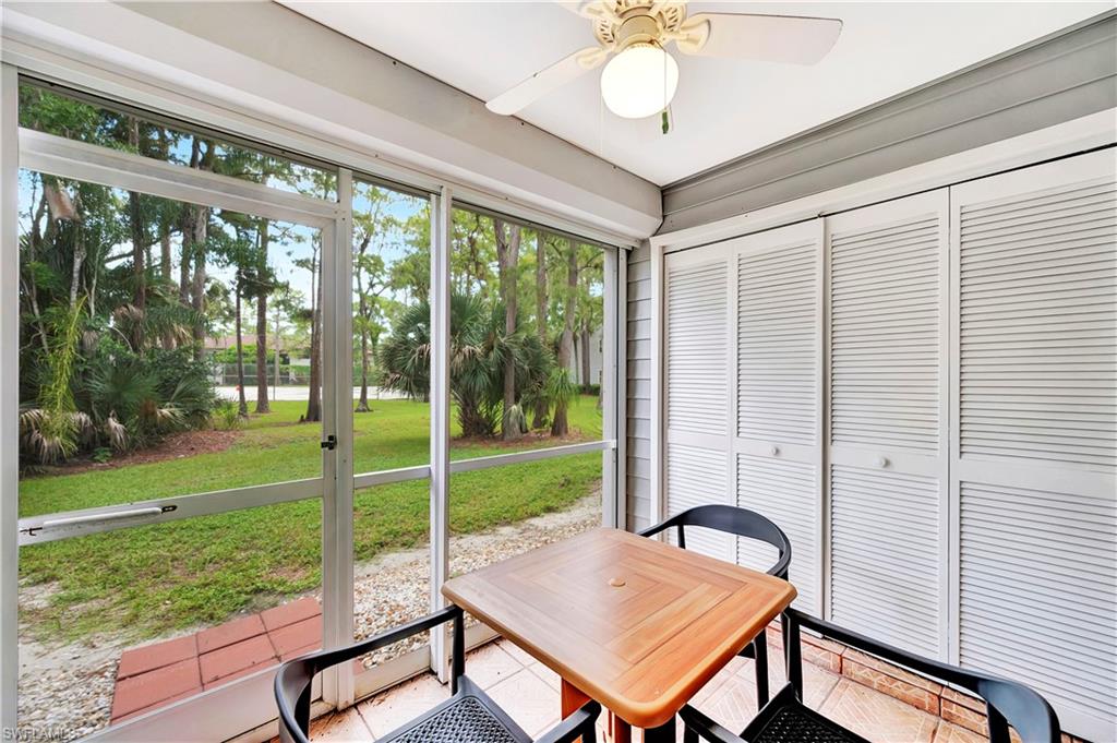 1925 Courtyard Way, Unit F101 Naples, FL 34112 - Photo 8 of 20 Screened Porch and Laundry Closet