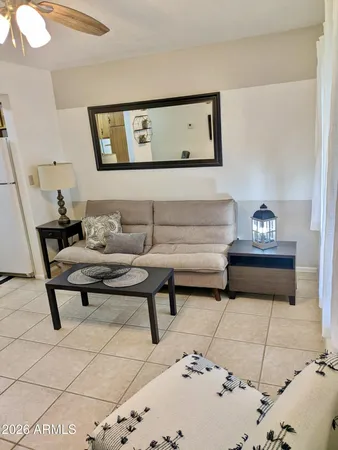 a living room with a couch and a table