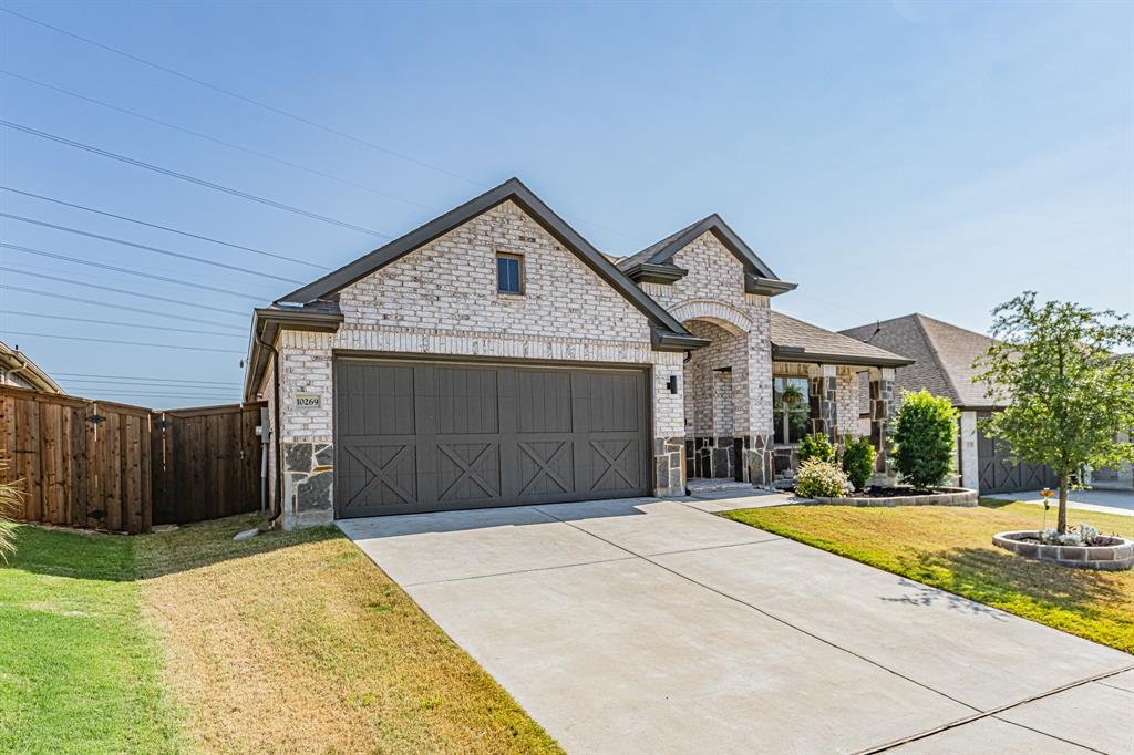 10269 Hanks Creek Road Fort Worth, TX 76126 - Photo 2 of 40 a front view of a house with a yard
