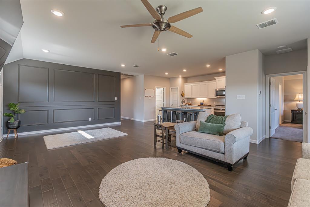 10269 Hanks Creek Road Fort Worth, TX 76126 - Photo 23 of 40 a living room with furniture and a view of kitchen