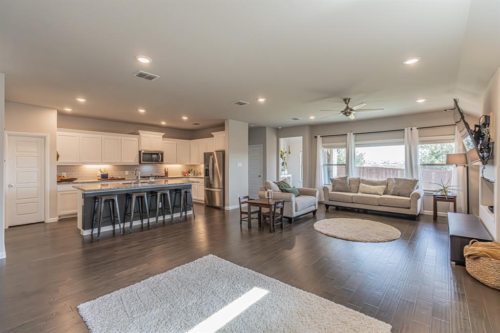 10269 Hanks Creek Road Fort Worth, TX 76126 - Photo 24 of 40 a living room with lots of furniture and kitchen view