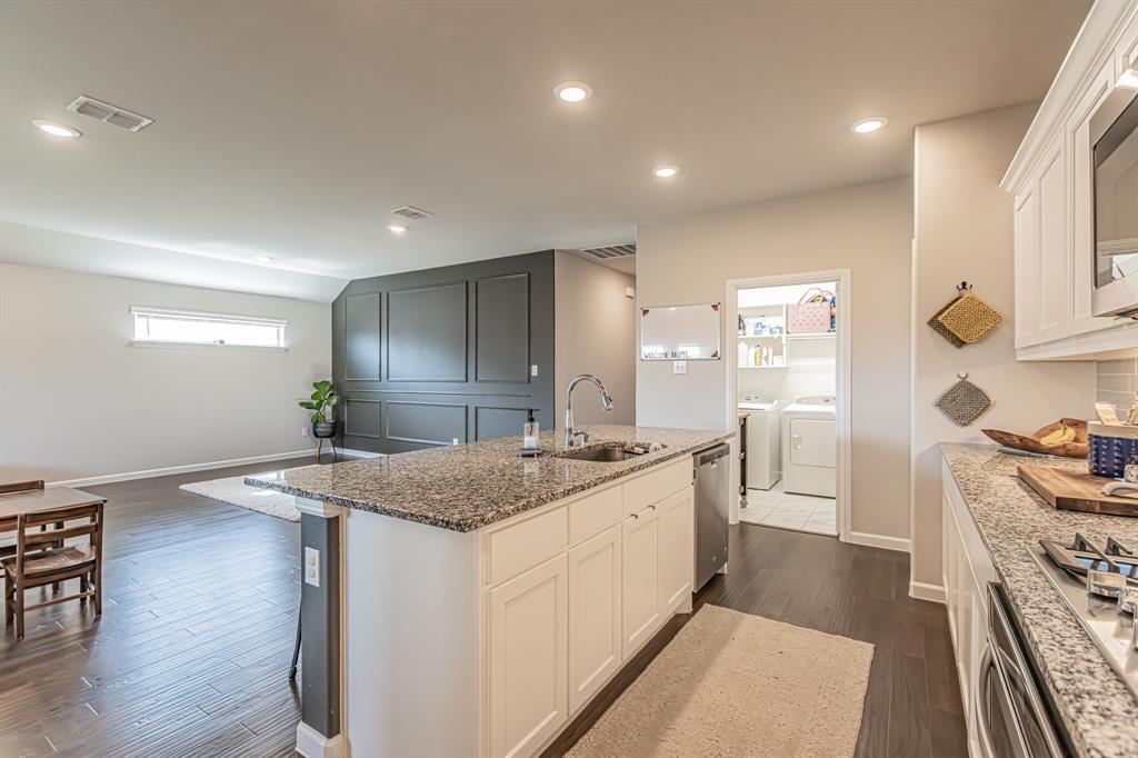 10269 Hanks Creek Road Fort Worth, TX 76126 - Photo 28 of 40 a kitchen with sink stove and refrigerator