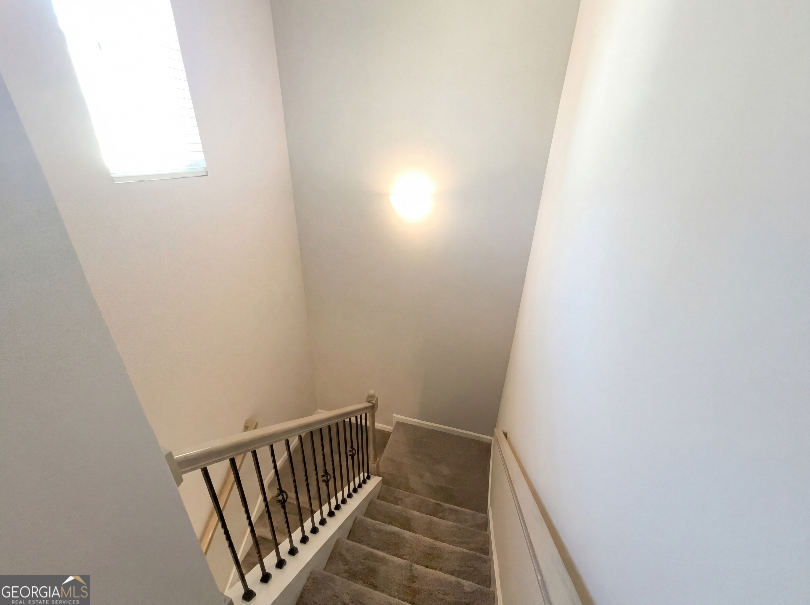 981 Fellowship Road, Unit 108 Fairburn, GA 30213 - Photo 11 of 21 a view of hallway with stairs