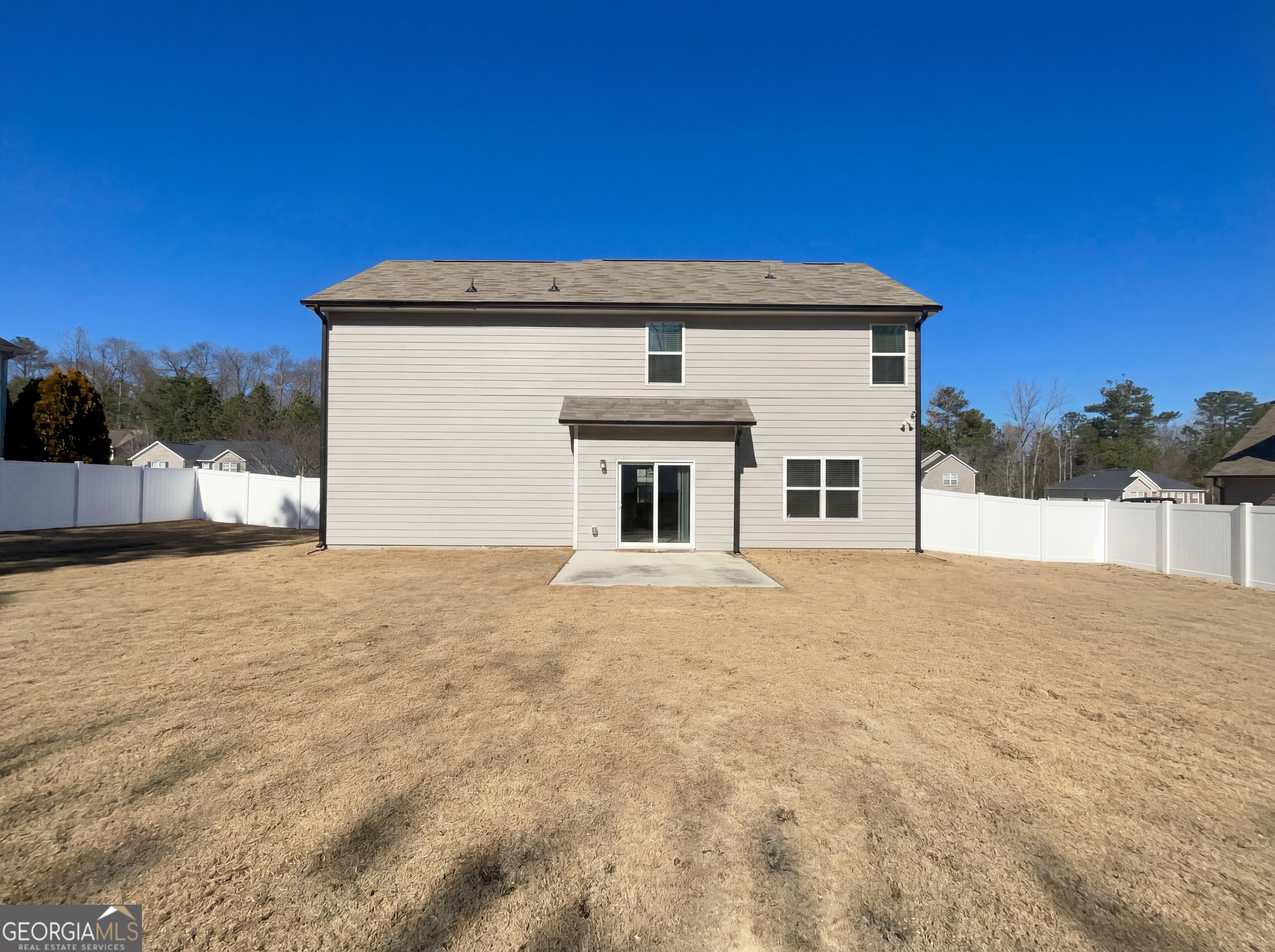 981 Fellowship Road, Unit 108 Fairburn, GA 30213 - Photo 5 of 21 a view of garage and yard