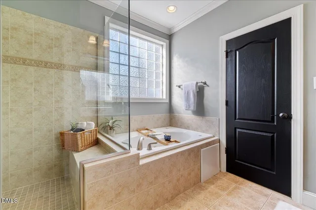 a kitchen with a refrigerator and a sink