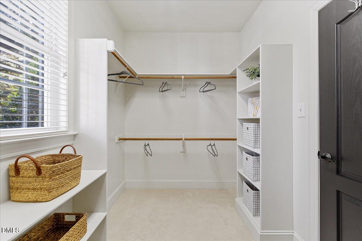 3628 Jamison Park Drive Apex, NC 27539 - Photo 26 of 60 a view of walk in closet with window