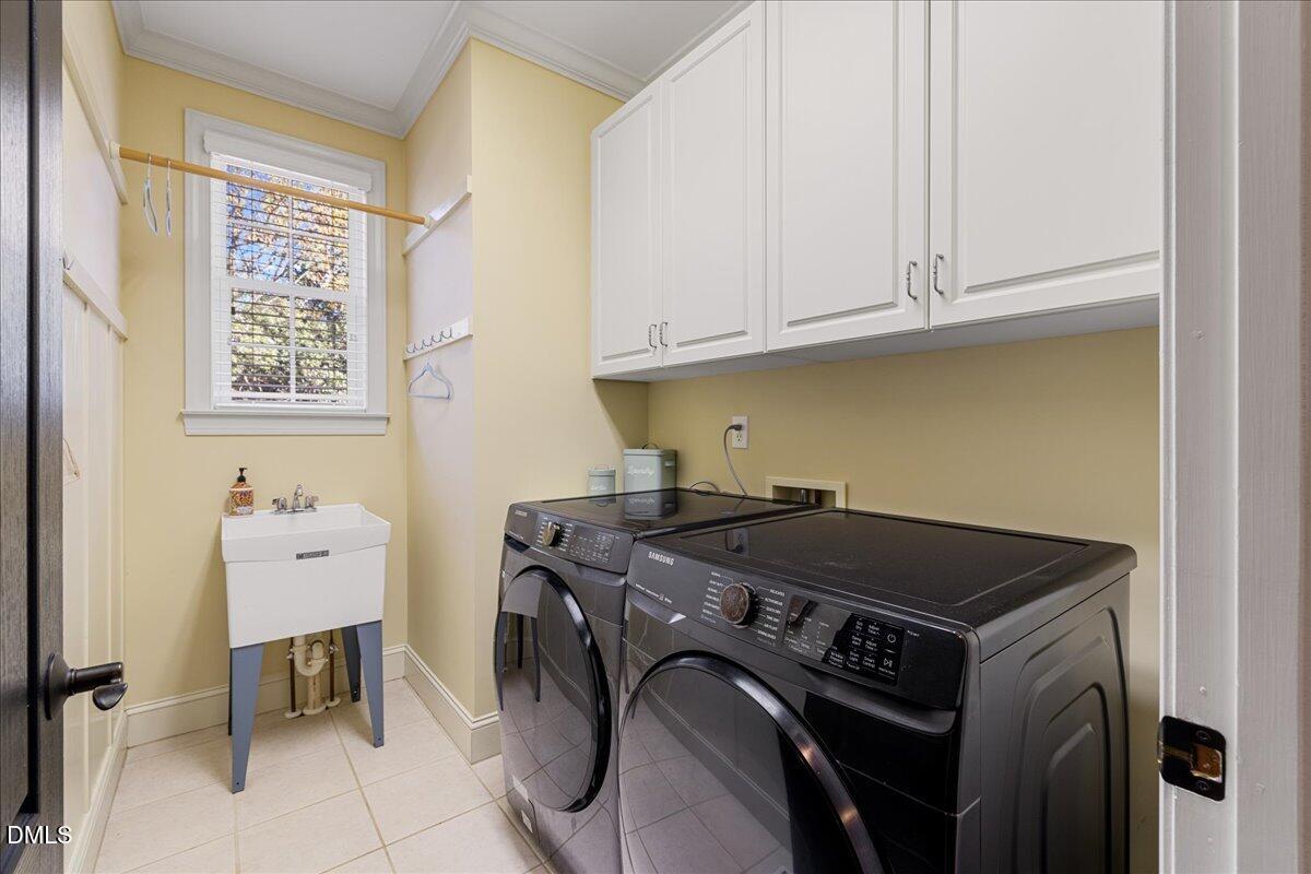 3628 Jamison Park Drive Apex, NC 27539 - Photo 28 of 60 a utility room with dryer and washer
