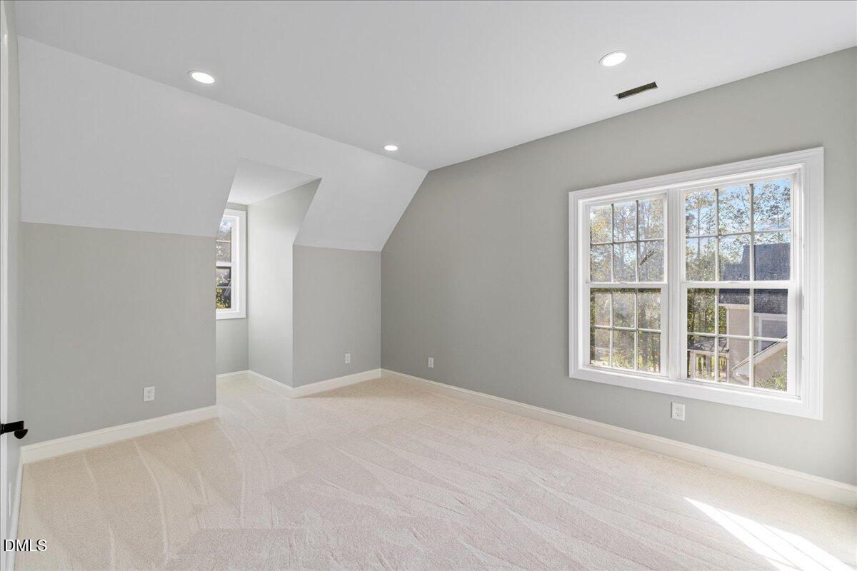 3628 Jamison Park Drive Apex, NC 27539 - Photo 33 of 60 a view of an empty room with a window