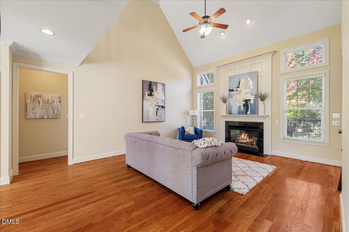 3628 Jamison Park Drive Apex, NC 27539 - Photo 9 of 60 a living room with furniture and a fireplace