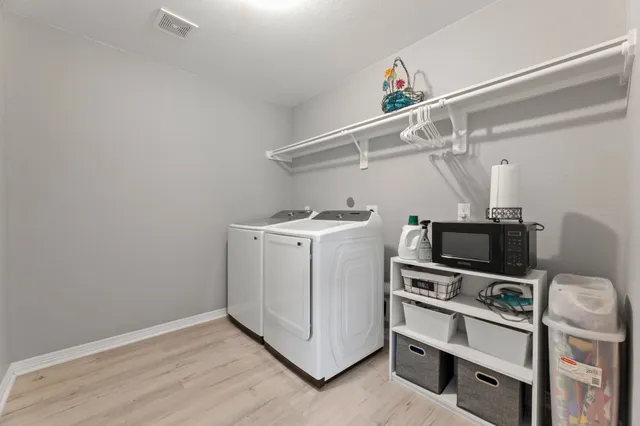 a view of a room with storage and utility room