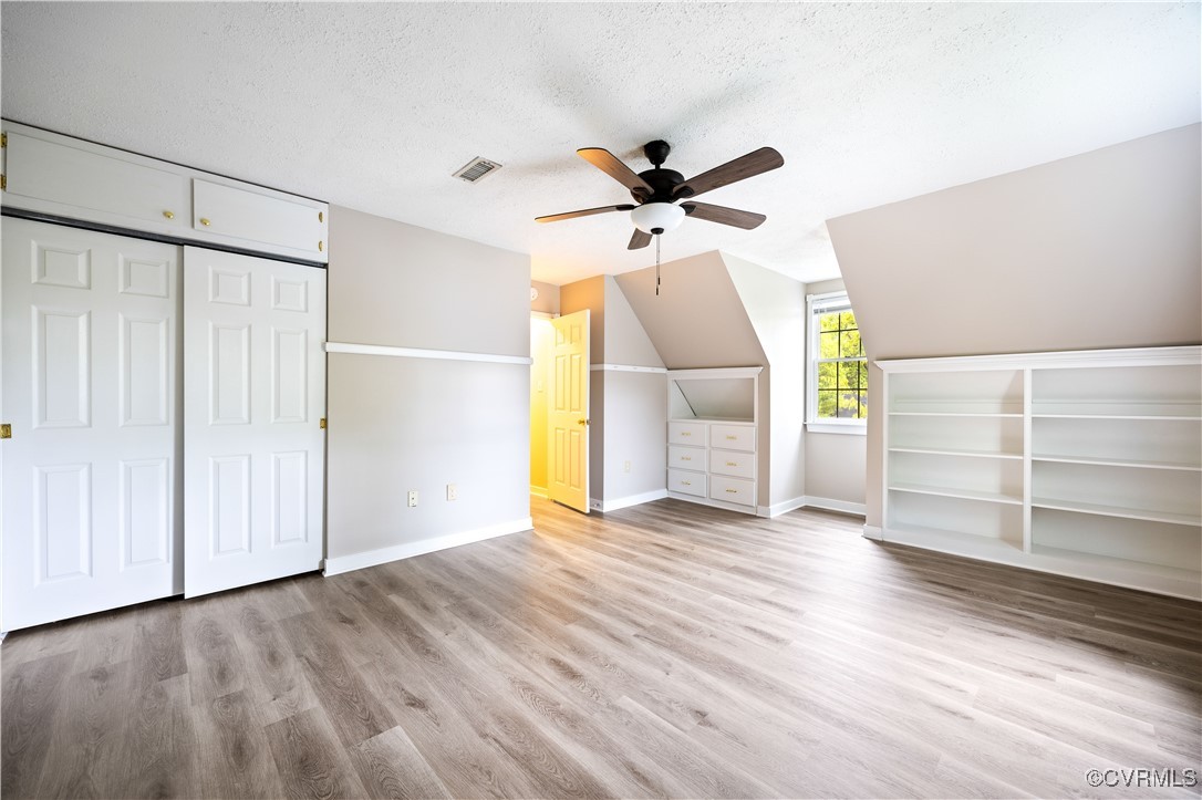 3012 Appleford Drive Chester, VA 23831 - Photo 14 of 25 a view of a room with wooden floor and a ceiling fan