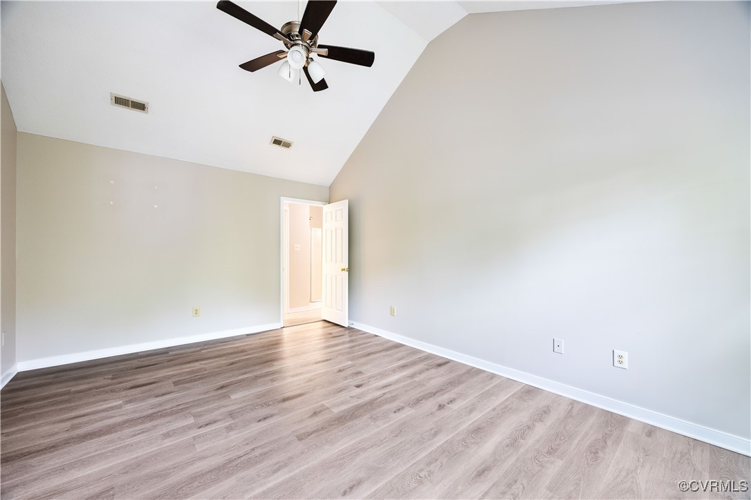 3012 Appleford Drive Chester, VA 23831 - Photo 19 of 25 an empty room with wooden floor and windows