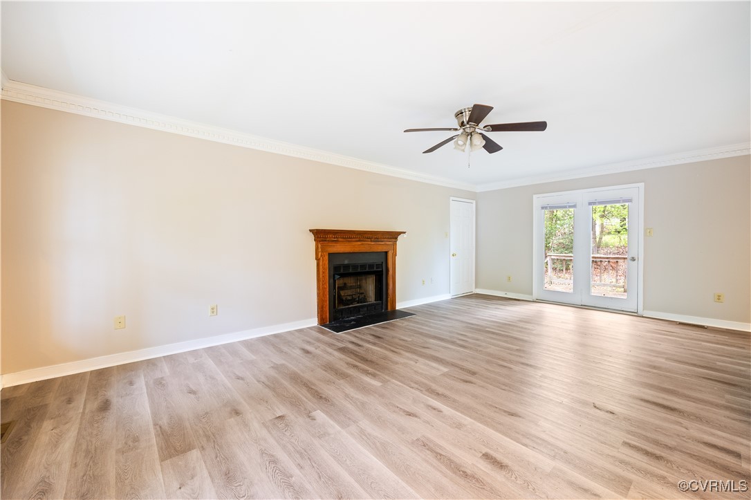 3012 Appleford Drive Chester, VA 23831 - Photo 2 of 25 an empty room with chandelier fan and windows