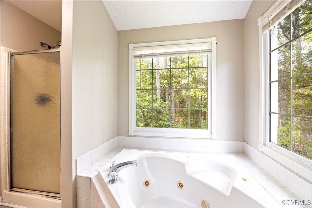 3012 Appleford Drive Chester, VA 23831 - Photo 21 of 25 a white bath tub sitting next to a window