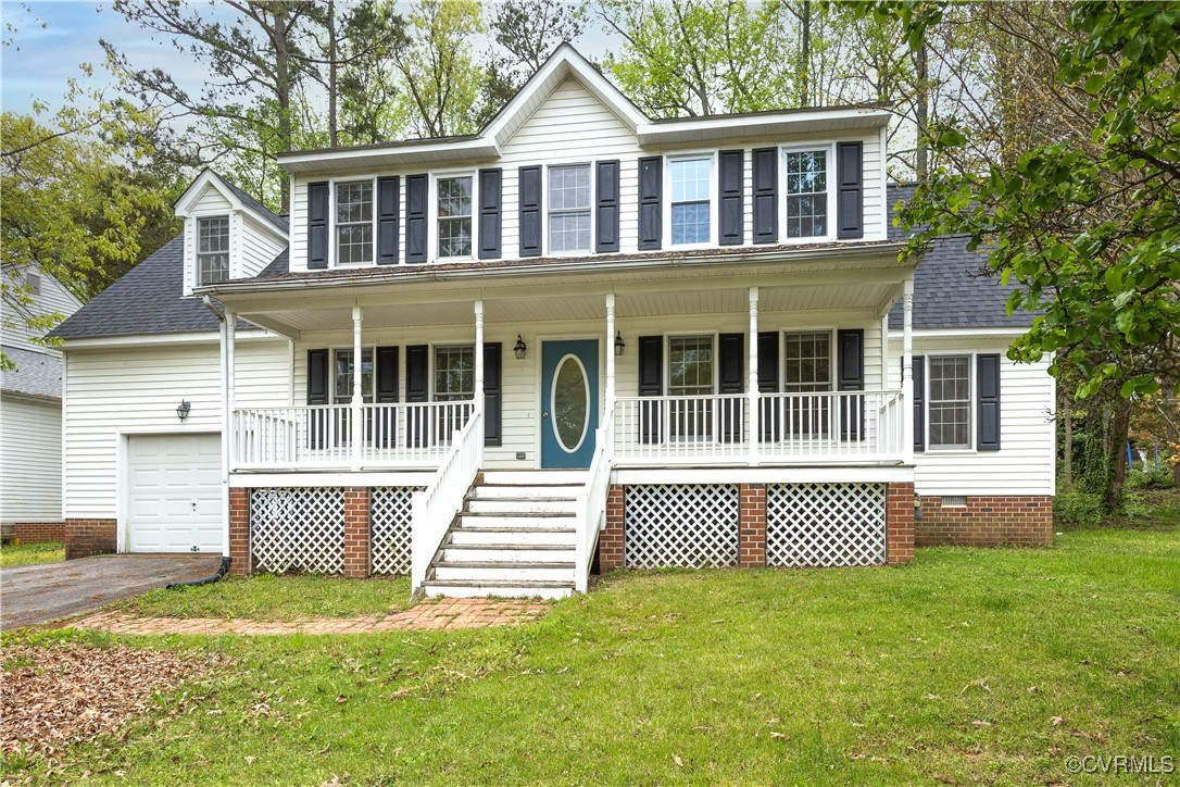 3012 Appleford Drive Chester, VA 23831 - Photo 24 of 25 a front view of a house with a garden