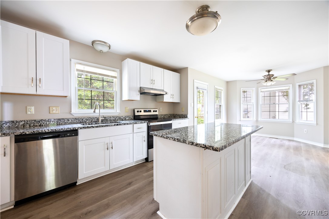 3012 Appleford Drive Chester, VA 23831 - Photo 4 of 25 a kitchen with stainless steel appliances granite countertop a sink and a stove