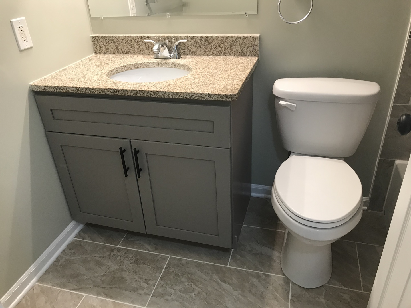 75 Saugatuck Road Montgomery, IL 60538 - Photo 14 of 22 a bathroom with a granite countertop toilet and a sink