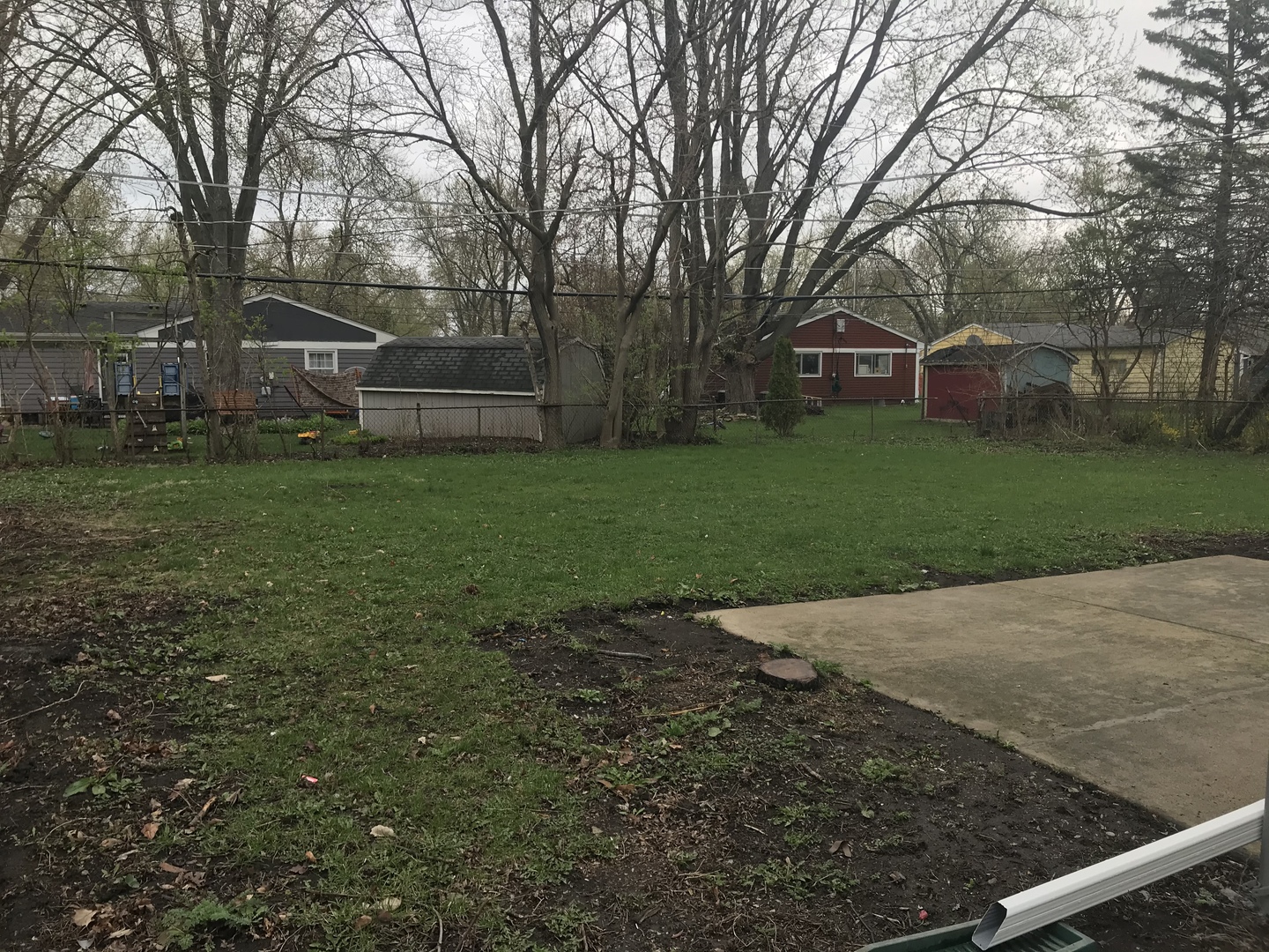 75 Saugatuck Road Montgomery, IL 60538 - Photo 22 of 22 a view of a backyard with large trees