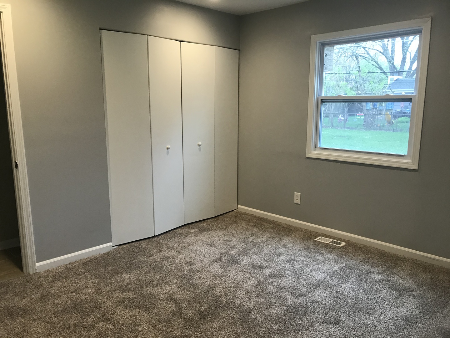 75 Saugatuck Road Montgomery, IL 60538 - Photo 9 of 22 an empty room with windows
