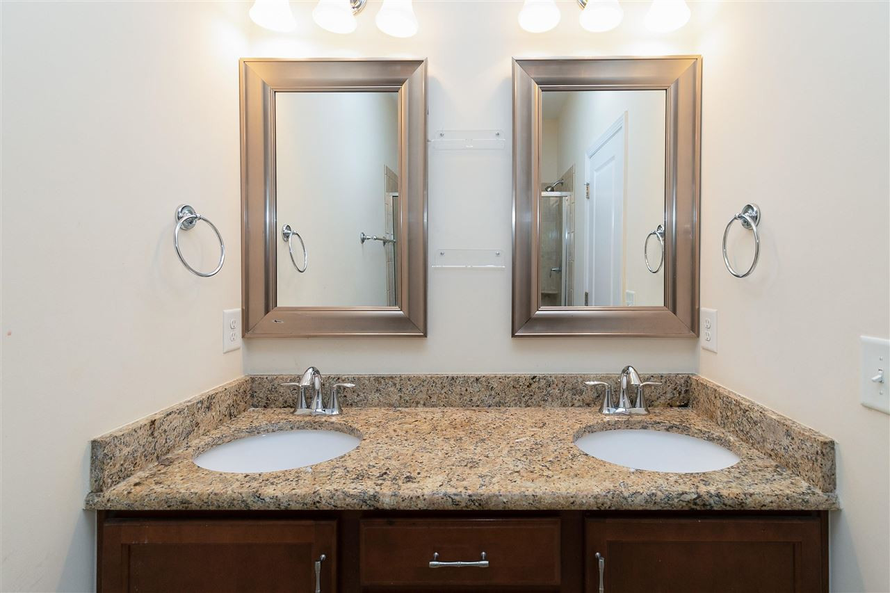1415 Crafton Way Raleigh, NC 27607 - Photo 13 of 25 Master Bathroom has Granite Counter Top and Dual Vanities