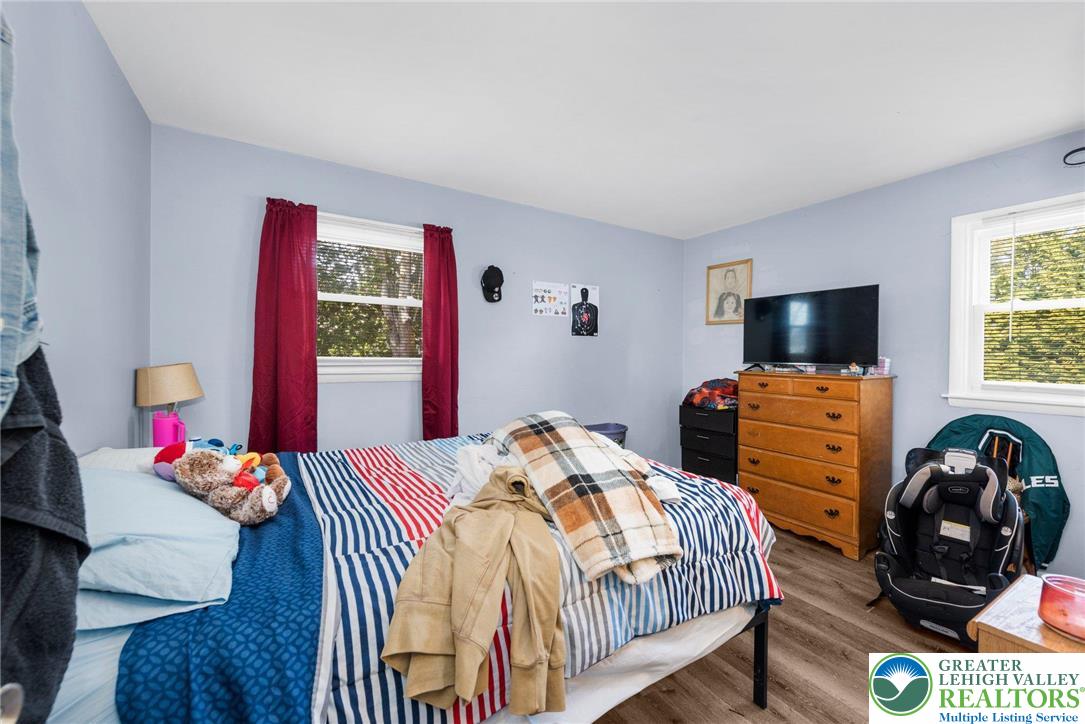 935 Marion Street Bethlehem, PA 18017 - Photo 11 of 20 a bedroom with bed and a tv