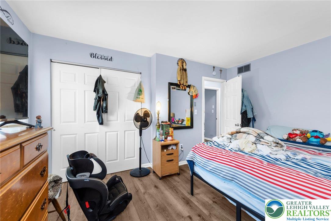 935 Marion Street Bethlehem, PA 18017 - Photo 13 of 20 a bedroom with bed and a flat screen tv