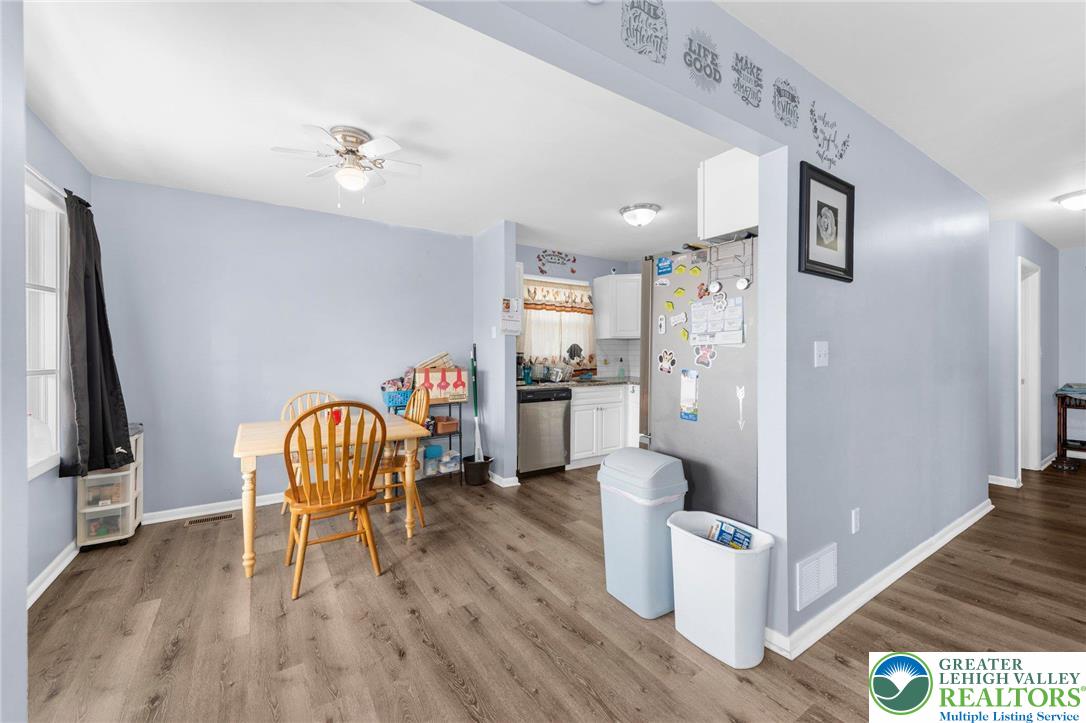 935 Marion Street Bethlehem, PA 18017 - Photo 4 of 20 a view of a hallway with wooden floor and entryway