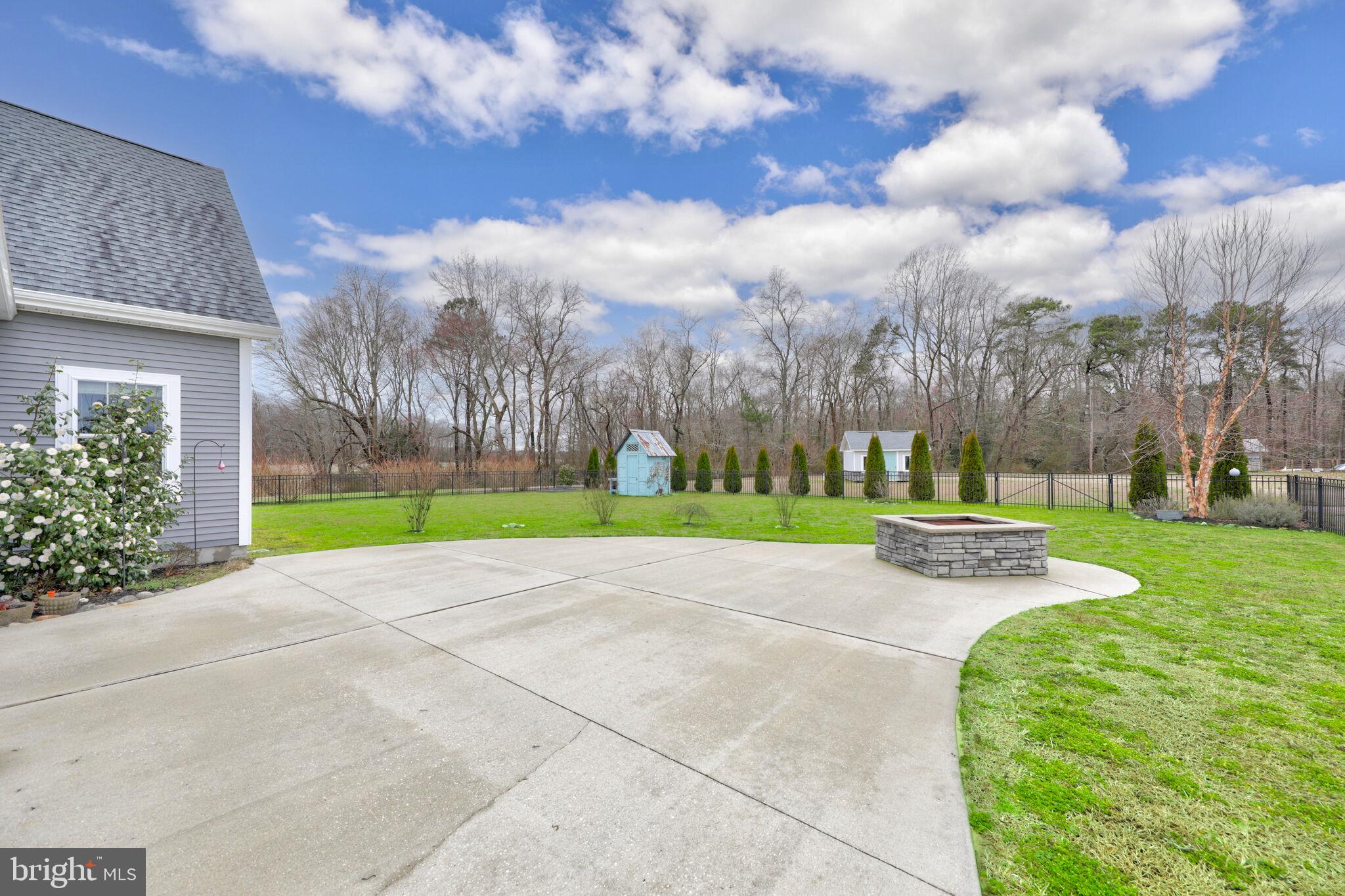 27807 Round Pole Bridge Road Milton, DE 19968 - Photo 59 of 71 Rear Fenced Yard, Patio, Firepit