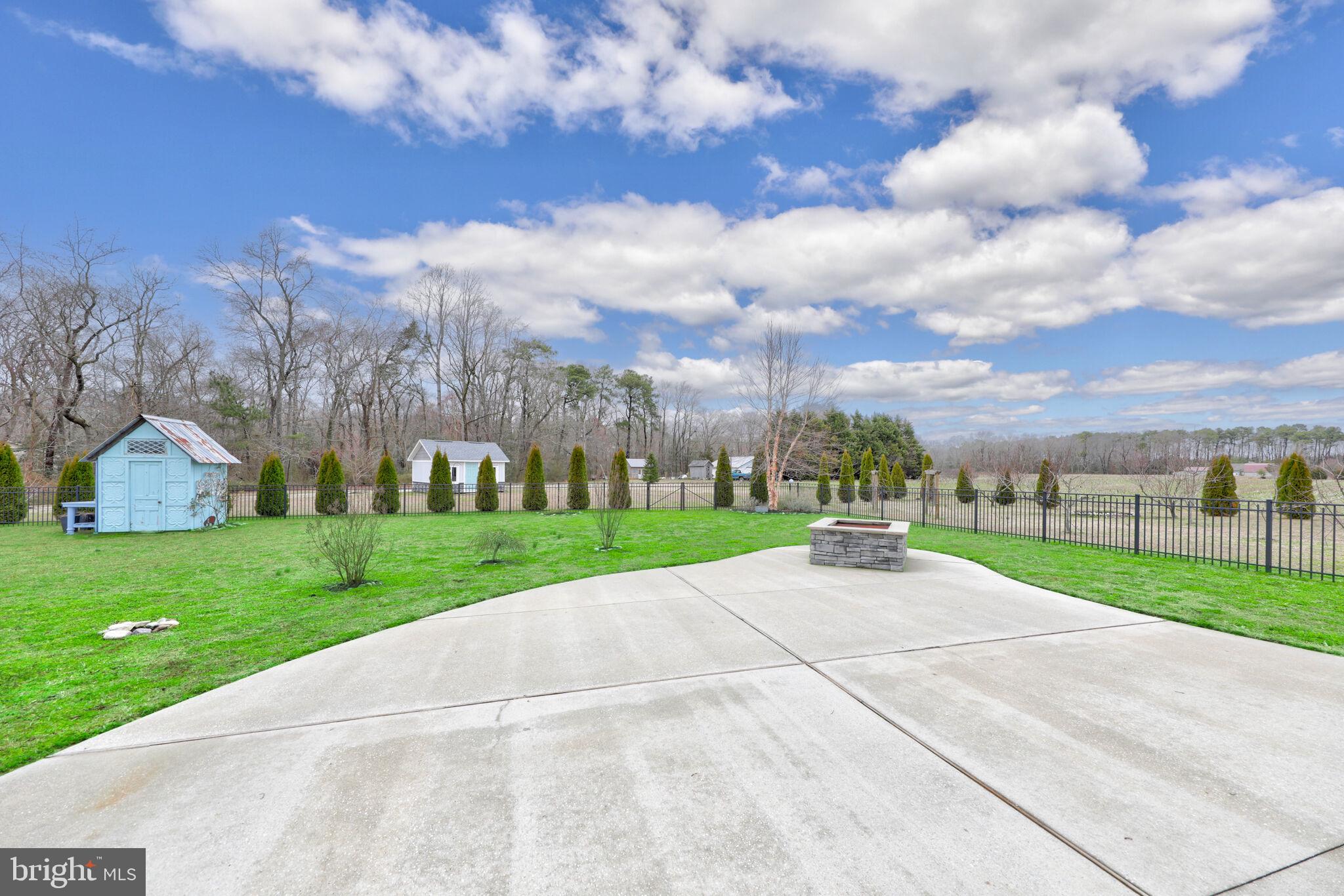 27807 Round Pole Bridge Road Milton, DE 19968 - Photo 60 of 71 Rear Fenced Yard, Patio, Firepit