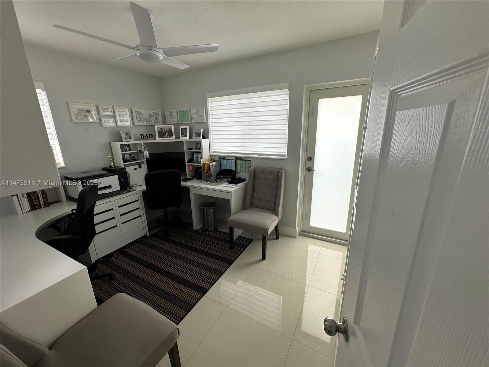 4610 Southwest 89th Place Miami, FL 33165 - Photo 15 of 52 a living room with furniture