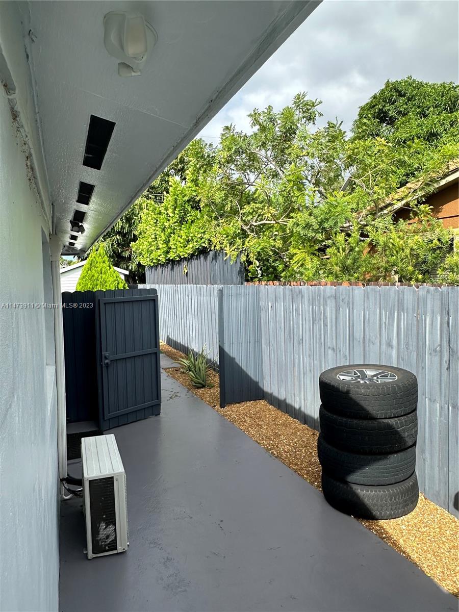 4610 Southwest 89th Place Miami, FL 33165 - Photo 27 of 52 a view of outdoor space with seating