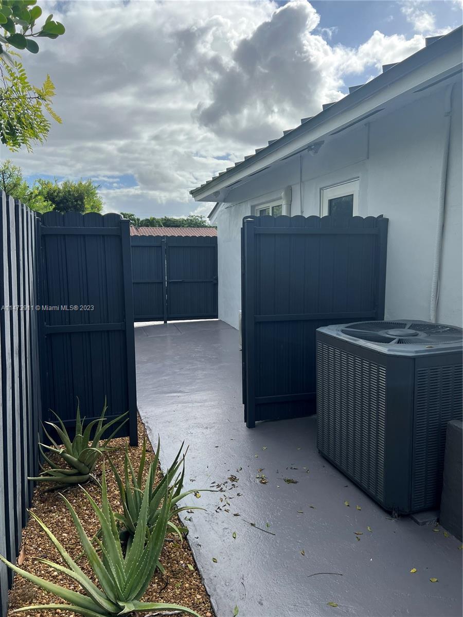 4610 Southwest 89th Place Miami, FL 33165 - Photo 32 of 52 a backyard of a house