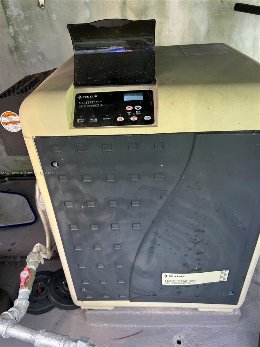 4610 Southwest 89th Place Miami, FL 33165 - Photo 37 of 52 a view of washer and dryer