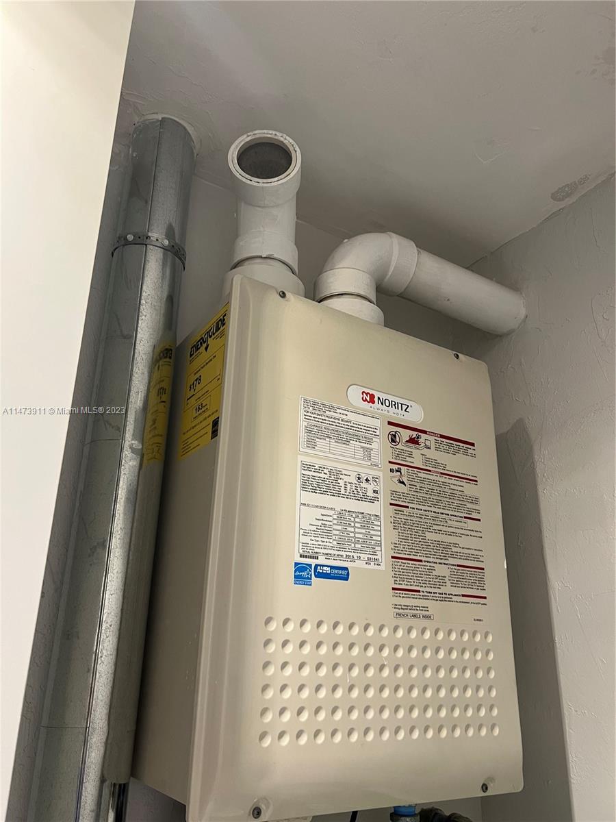 4610 Southwest 89th Place Miami, FL 33165 - Photo 45 of 52 a close view of cabinet