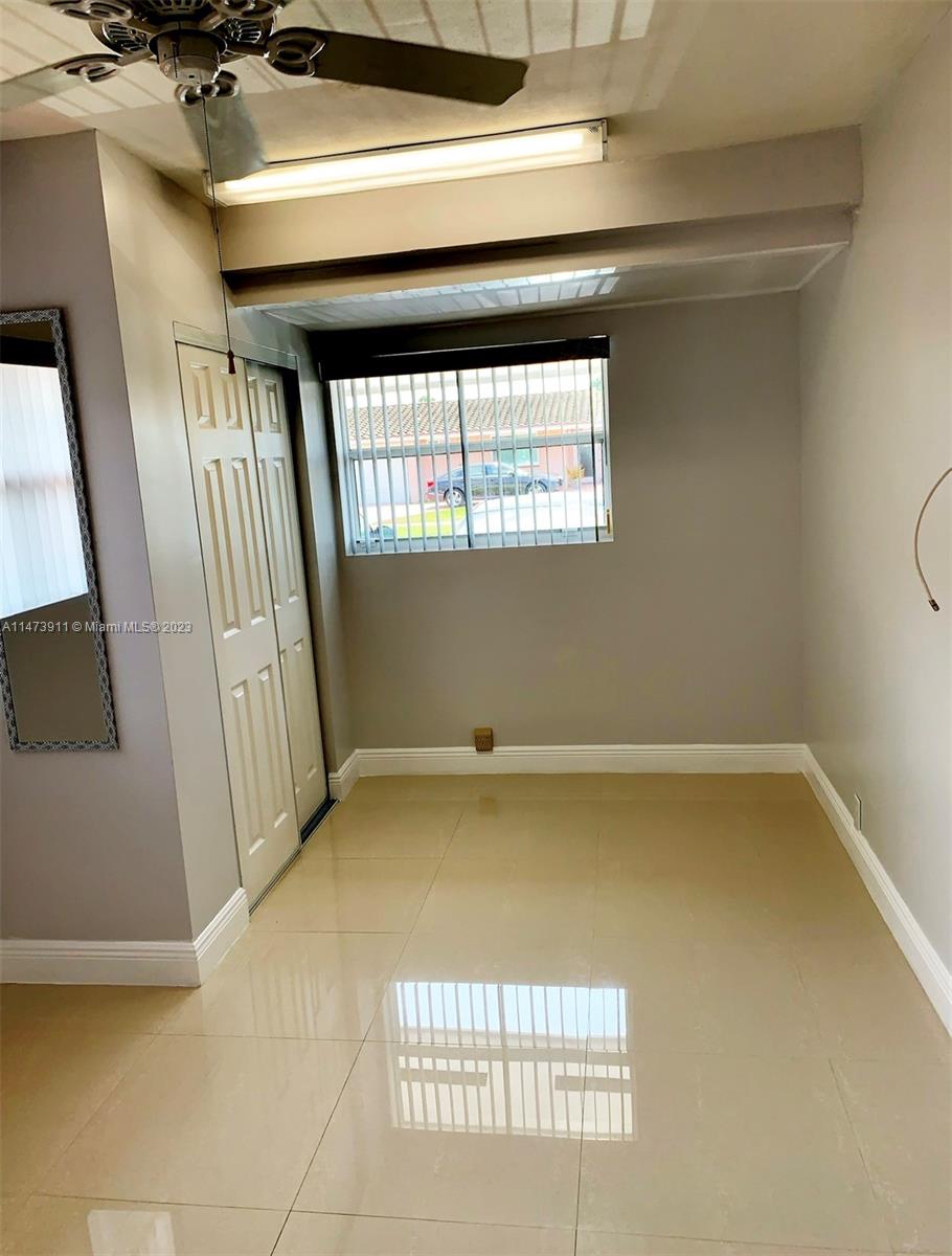 4610 Southwest 89th Place Miami, FL 33165 - Photo 46 of 52 a view of a hardwood floor and staircase