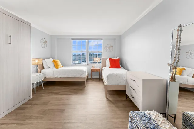 a bedroom with furniture and a couch